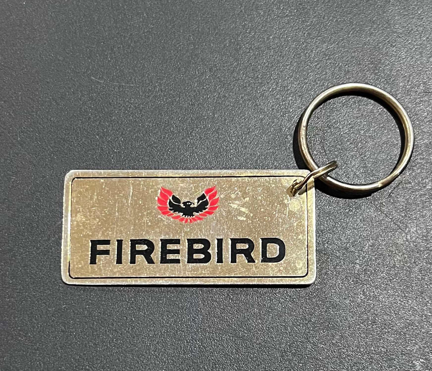 Pontiac Firebird Gold Plated Metal Keychain with Engravable Backside NOS Relic has been store safely away for decades and shows some wear but vintage from the 1980s