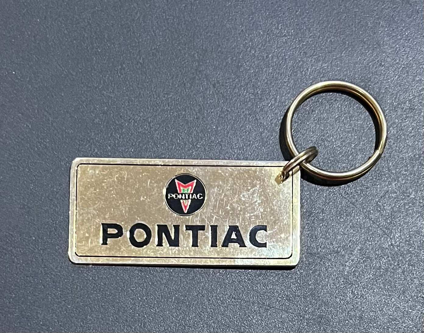 Pontiac Arrowhead Gold Plated Metal Keychain with Engravable Backside NOS Relic has been store safely away for decades and shows some wear but vintage from the 1980s