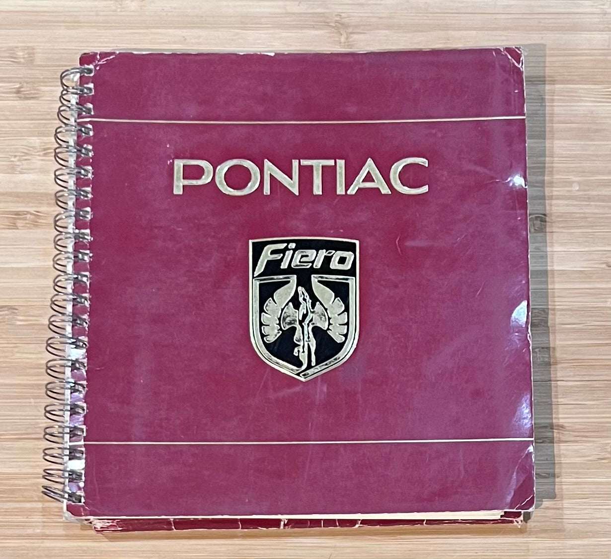 Pontiac Fiero 1984 Original Owners Manual 3 pc Set NOS DYI Maintenance Relic has been store safely away for decades and loaded with original information on each