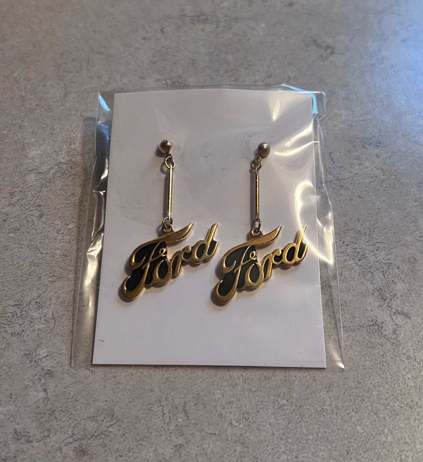 Ford Gold Color Earrings Script Pair Post Hypo Allergenic Accessories EXC Relic has been store safely away for decades and will be a great compliment to your classic