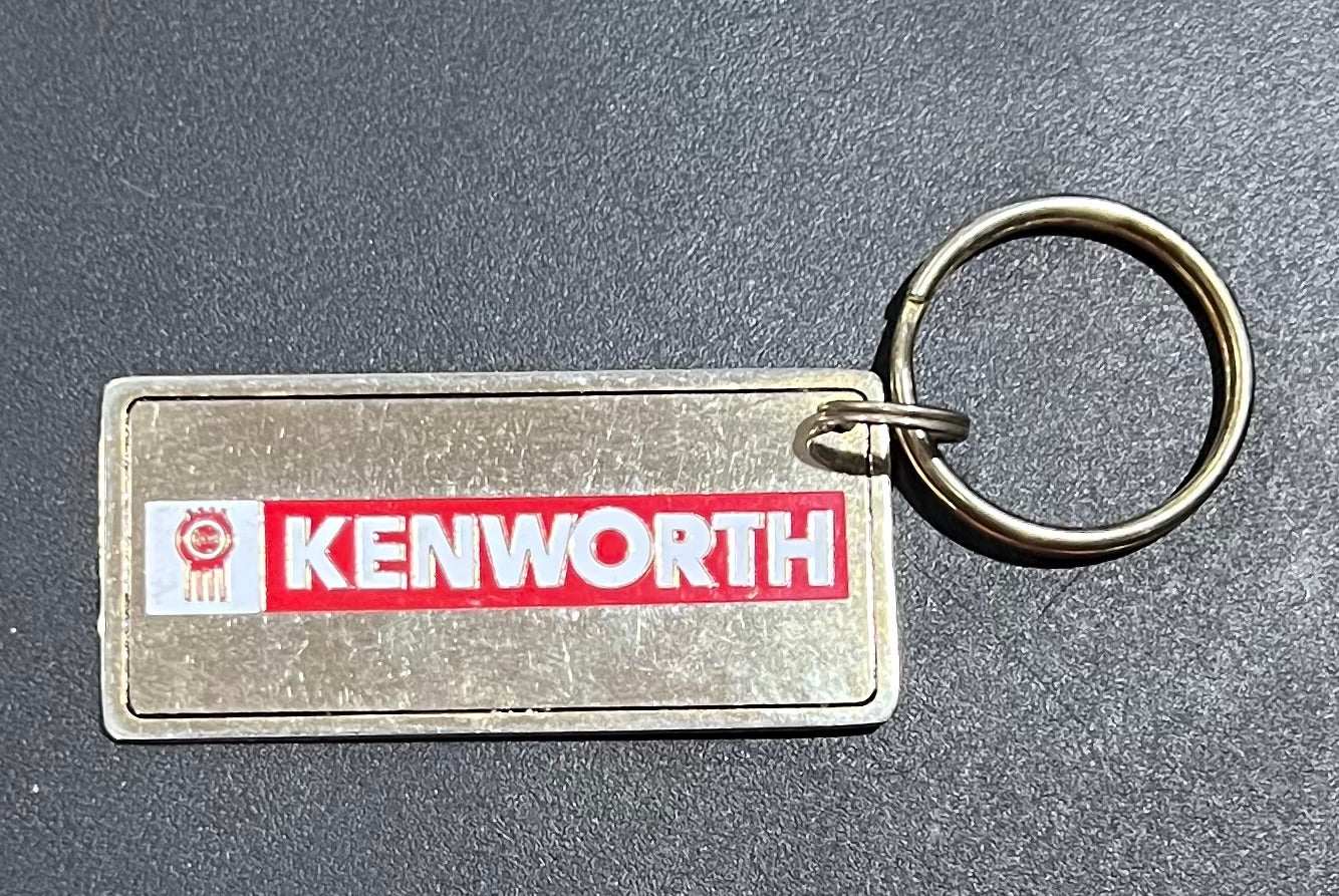 Kenworth Logo Gold Plated Metal Keychain with Engravable Backside NOS Relic has been store safely away for decades and shows some wear but vintage from the 1980s