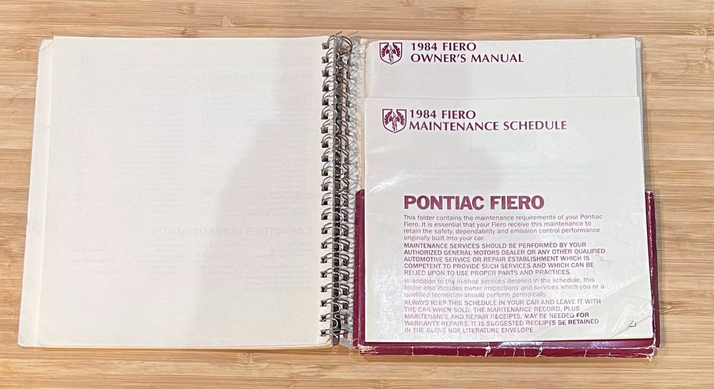 Pontiac Fiero 1984 Original Owners Manual 3 pc Set NOS DYI Maintenance Relic has been store safely away for decades and loaded with original information on each