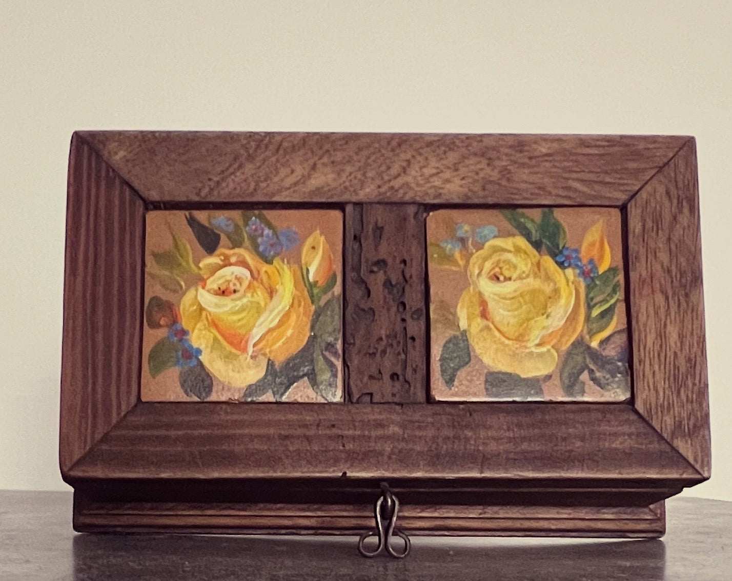 Vintage wooden trinket box with tiled yellow rose top. Adorable treasure chest, unique accessory and well made. The box is 7 1/4 inches long, 4 inches wide and