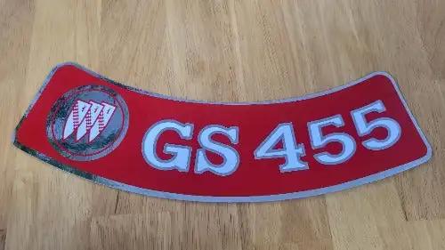 Buick GS 455 Decal Red Metallic Air Cleaner 1970-1974 Auto N.O.S. Item. This relic has been stored for decades and measures 3 inches in width by 11 inches in length.