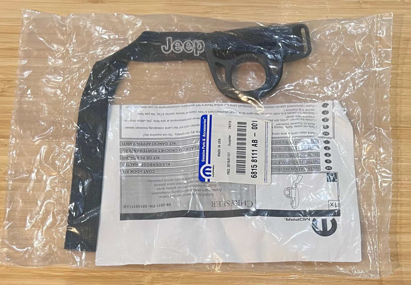 Jeep Strap for Storage and Holder from 2015 Sahara Collectors N.O.S. Relic has been safely stored away for last 10 years and would make for a great replacement or gift