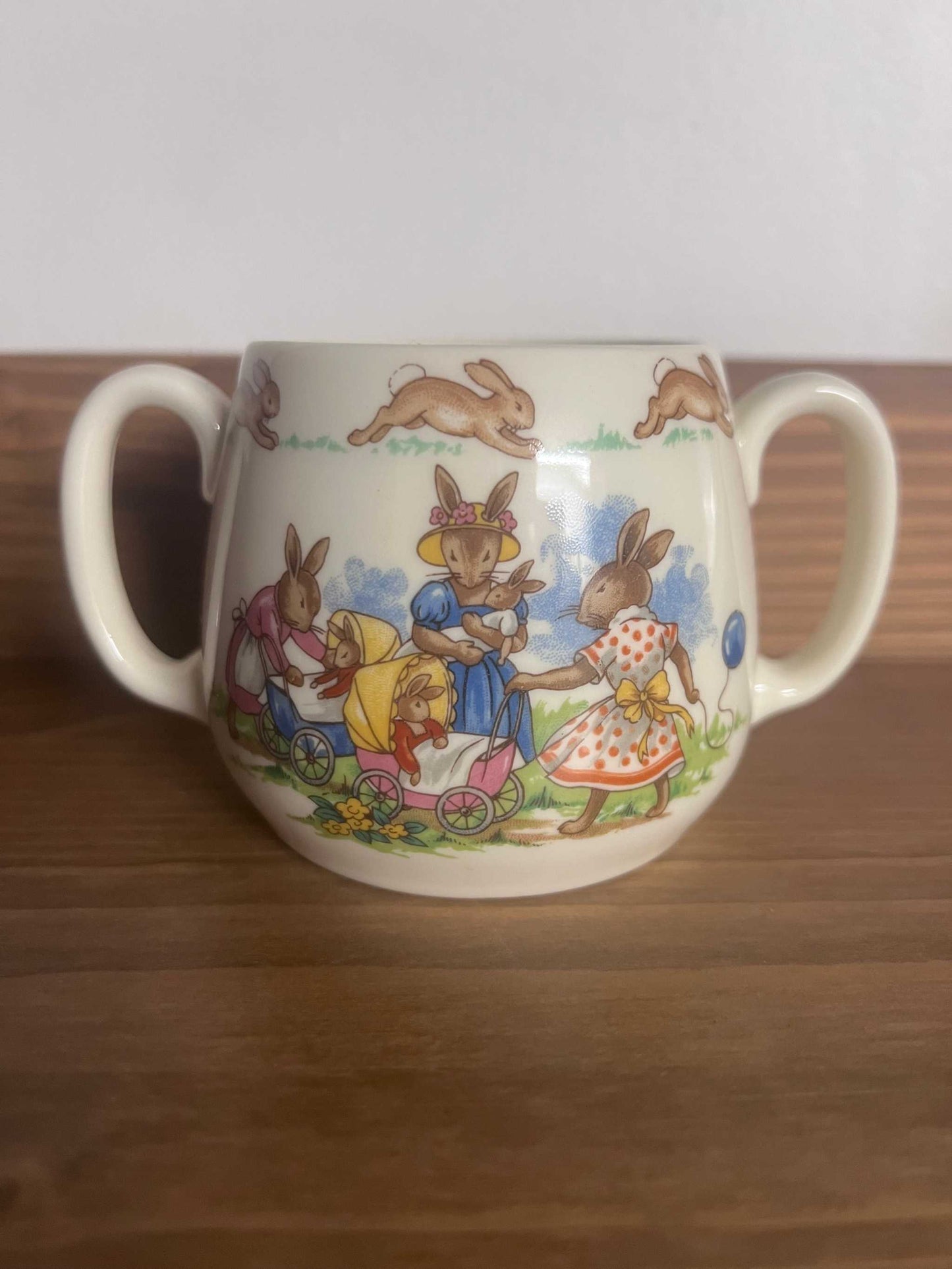Royal Doulton Bunnykins mug, Vintage Bunnykins Hug a Mug, Bunnykins Twin Handled Cup. Made In England. Excellent vintage condition