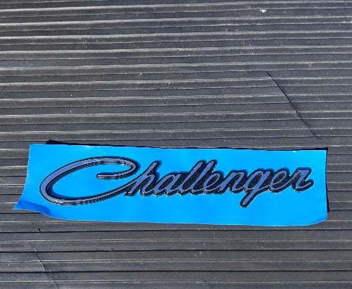 DODGE CHALLENGER Emblem Accessories Traditional Challenger script. Emblem chrome plated border recessed black backing. Checkout our other Mopar and Challenger items