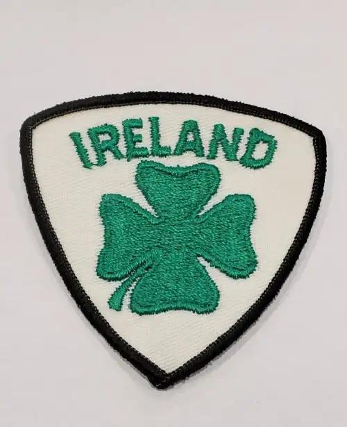 IRELAND Clover Patch Lucky Mint Vintage Item St Patrick's Day N.O.S. Item measures approximately 3 x 3 inch shield, bright vibrant green with the black border.