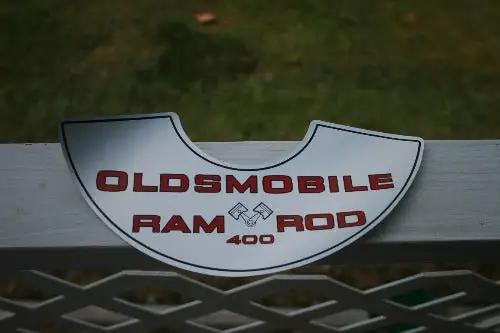 OLDSMOBILE RAM ROD 400 Decal Top Lid AIR CLEANER MINT NOS. Item measures 10.5 x 3.5 inches. Mint condition and stored away for decades. Any questions please email.