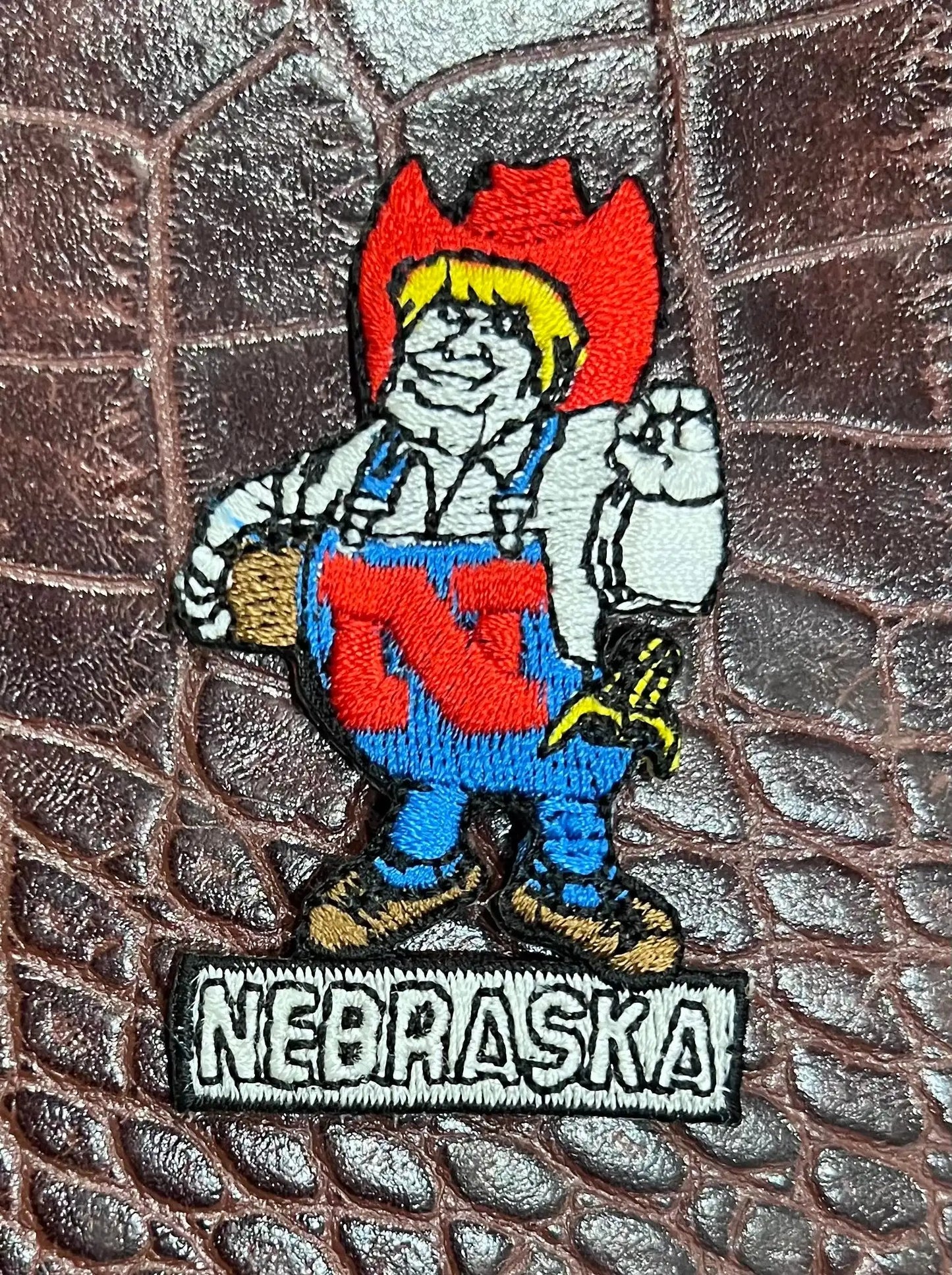 NEBRASKA CORNHUSKERS PATCH Set for the NCAA fanatic or alumni.  These are vintage items, and make a great deal as sold in a set