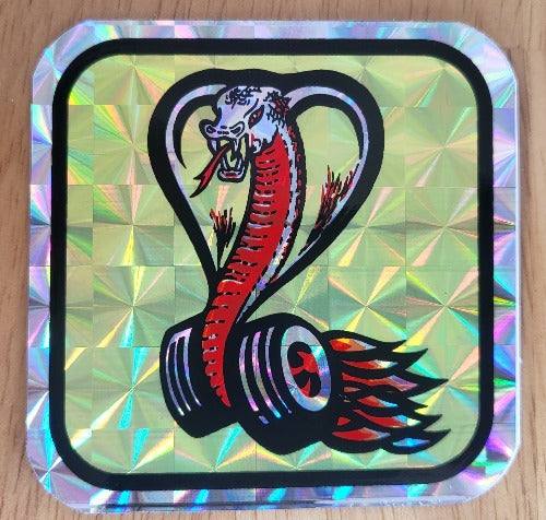 1970s Iridescent Cobra Flaming Wheels Ford DECAL Bumper sticker WOW RETRO Turning back the clock big time with this adhesive decal. This relic measures approx 3 in