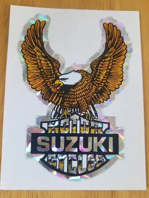 Suzuki Eagle Wings DECAL 1970's Iridescent Logo Motorcycle WOW RETRO Turning back the clock big time with this adhesive decal. relic measures approx 3.5 in X 2.25 in
