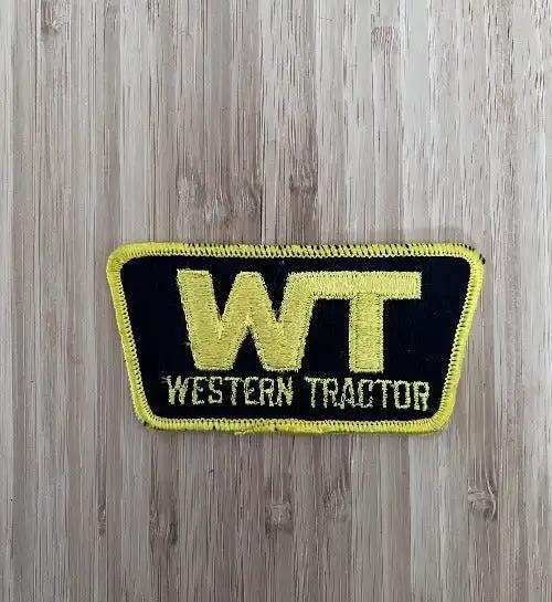 Western Tractor Vintage Patch Farm New Old Stock Item in Mint Condition  relic has been stored for decades and measures 2 inches in width by 4 inches in length