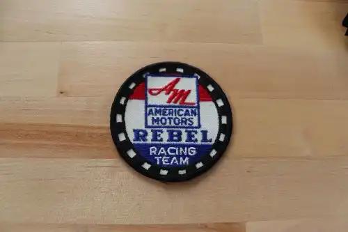 AMERICAN MOTORS REBEL RACING TEAM PATCH NOS VINTAGE EXC STITCHING AMVINTAGE NOS AMERICAN MOTORS REBEL RACING TEAM patch measuring 3X3  inches.  A great piece to add to your vintage collection.  Never sewn or displayed, rare to find patch from PG Relics