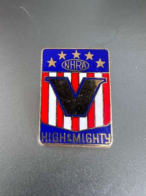 NHRA Drag Racing Pin V HIGH & MIGHTY USA 5 Stars Detailed Mint NOSThis rectangular pin is approximately 1 inch long and 1/2 inch wide, painted on gold metal and looks fantastic!!  
Check out all our authentic NHRA stock; decals patAutomotivePG Relics