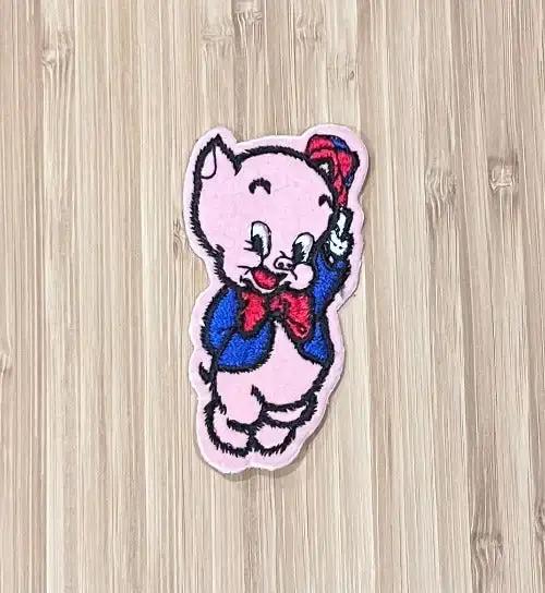 PORKY PIG LOONEY TUNES DieCut PATCH Characters Cartoon Classic Vintage stored away for decades. The item measures approximately 3 1/2 inches x 2 inches. Great Gift!