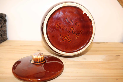 Hull Brown Drip Bean Pot with Lid from the 1970's in mint NOS condition.   Ceramic pottery, Made in USA, oven proof.   This is a solid piece of cookware, nostagic