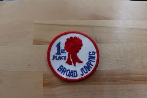 Horse BROAD JUMPING 1st Place Ribbon PATCH. Item measures approx 3 in circle and is in great vintage condition. Great detail stitching and 1st place is now yours
