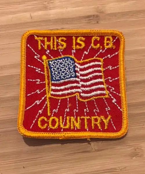 CB Country USA Flag PATCH, measuring 3 in square with the USA Flag centered. Long haulers, truck drivers, cross country machines, this one is for you! Vintage item