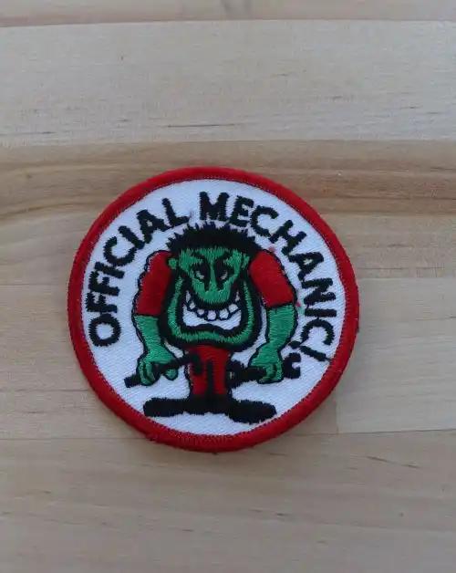 OFFICIAL MECHANIC CHARACTER PATCH 1970s VINTAGE MINT N.O.S. UNIQUE Relic has been safely stored away for decades and measures approx 3 inches circle detailed fun