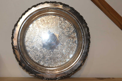 Vintage Silver plated butlers serving tray, copper base.  Back stamp states Royal Mounted Wm. A. Rogers S.P. Copper B M MTS 8429