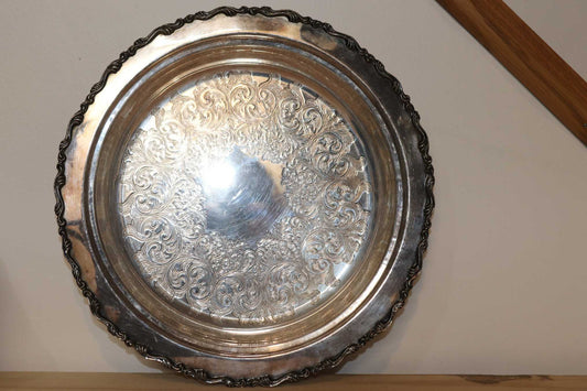 Vintage Silver plated butlers serving tray, copper base.  Back stamp states Royal Mounted Wm. A. Rogers S.P. Copper B M MTS 8429
